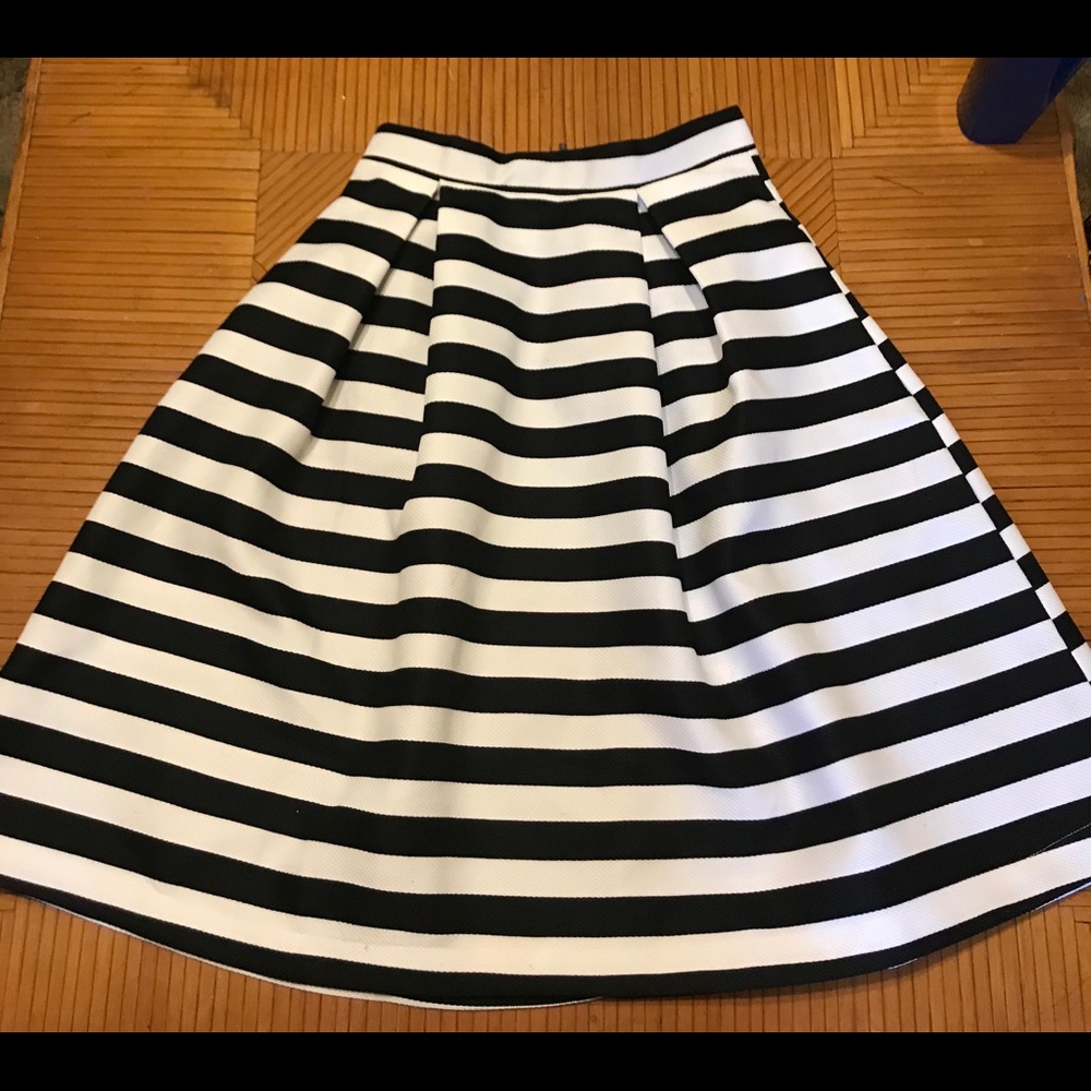 Woman’s box pleated skirt